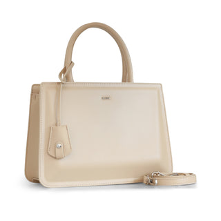 Bolsa satchel lisa AGATHA con doble asa y colgante decorativo