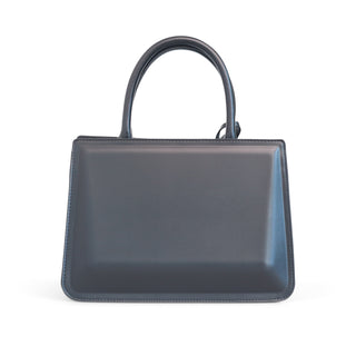 Bolsa satchel lisa AGATHA con doble asa y colgante decorativo